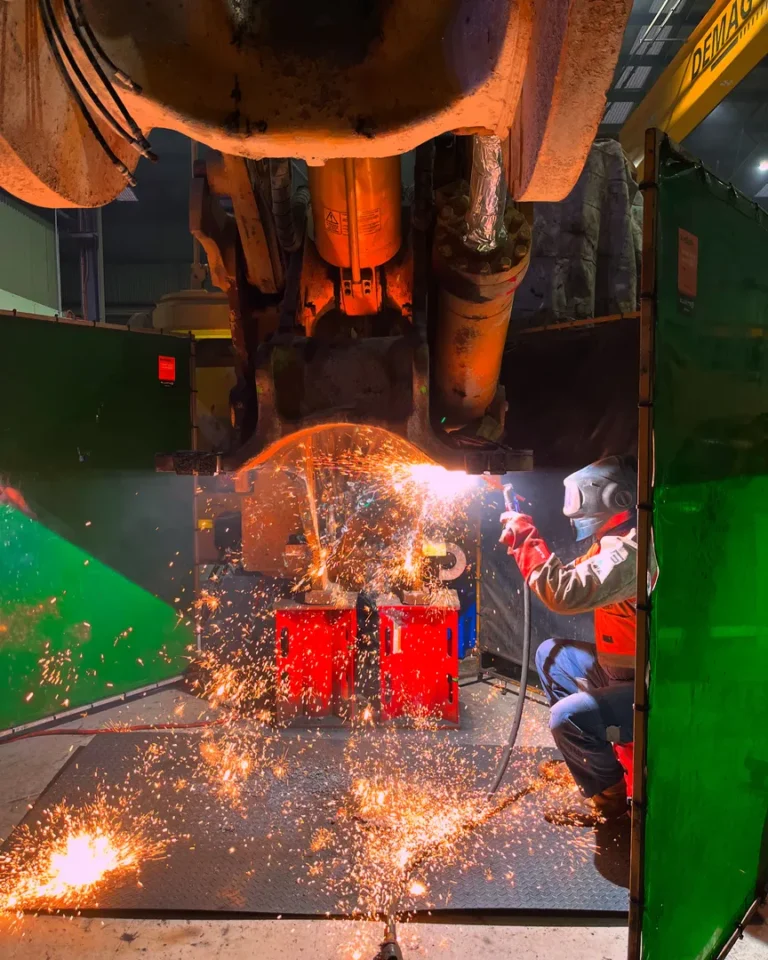 Welder working with sparks