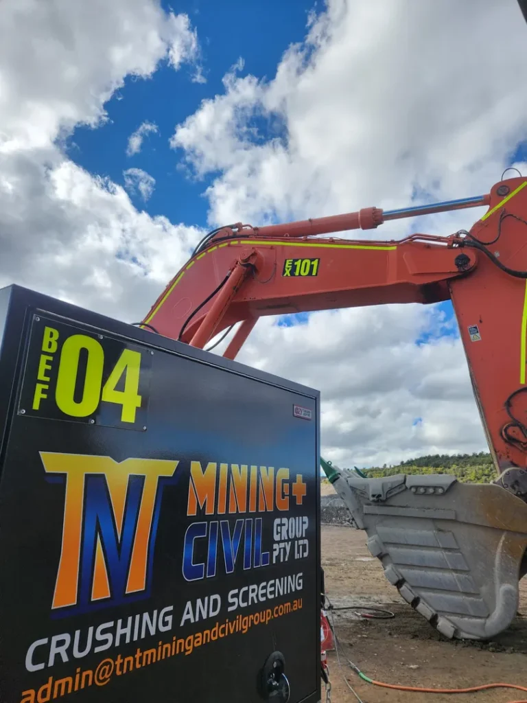 Mining equipment with company logo and email.